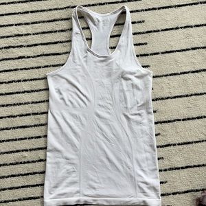 ZYIA white copper charged tank. Size small